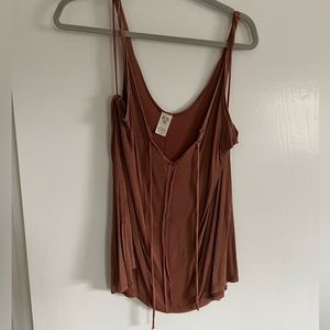 We the Free tank top. Rust color. Size Medium.